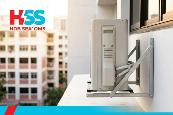 Outdoor compressor unit properly mounted on HDB aircon ledge in Tampines